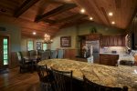 Granite counter tops, stainless steel appliances,  and custom cabinetry in the well equipped kitchen